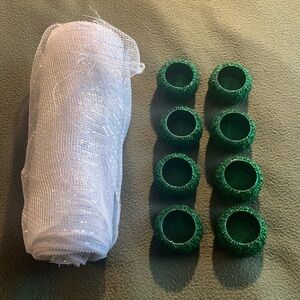 White mesh table runner & 8 green beaded napkins rings. Runner  10” x 9 yds 28”